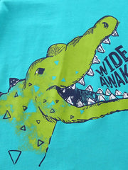 Toddler cotton tee with a green crocodile graphic and triangle pattern.