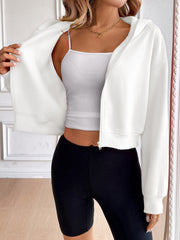 White cropped hooded zip-up sweatshirt with a relaxed fit.