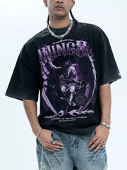Oversized black graphic tee with purple angel design and text, cotton blend.