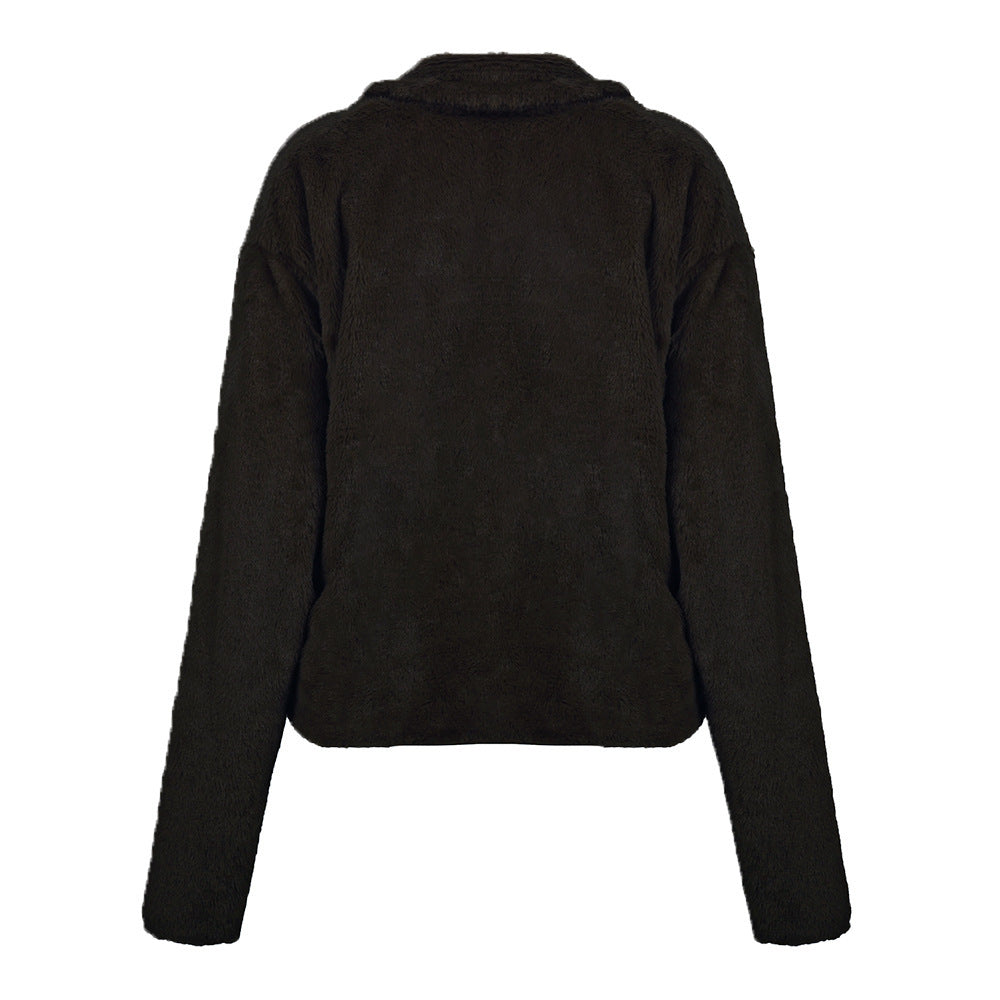 Faux fur biker jacket in chocolate brown with a collar and long sleeves.