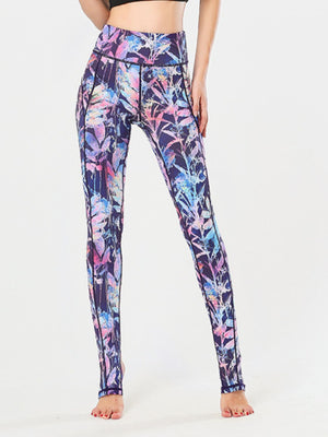 Prism Palm stirrup leggings in a vibrant floral print with a high waist and performance fabric.