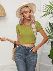Yellow-green cable knit crop top with square neckline and short sleeves.