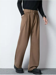 Men's dark brown wide-leg pleated trousers with a relaxed fit and zip fly.