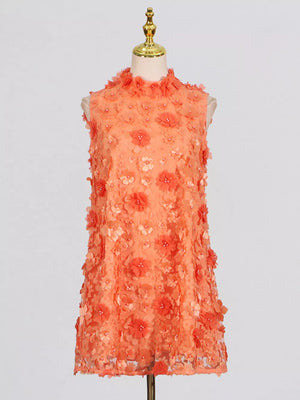 Orange ruffled floral applique mini dress with a high neckline and sleeveless cut.