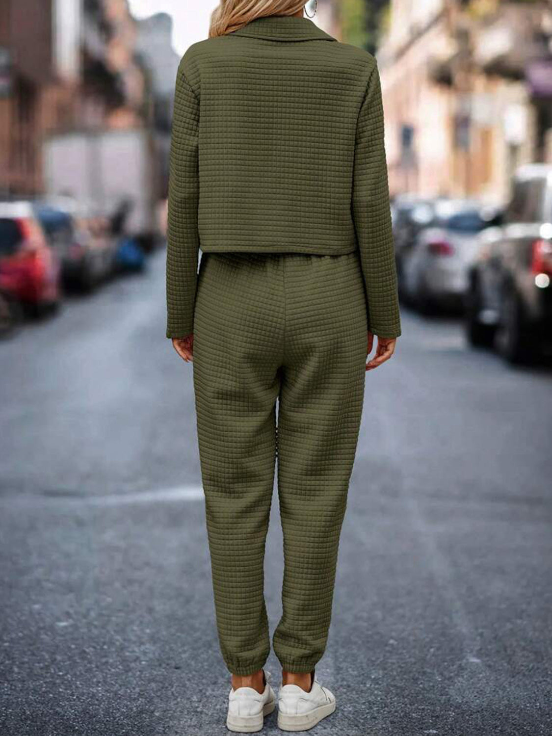 Army green quilted jacket and joggers set with a cropped jacket and cuffed pants.