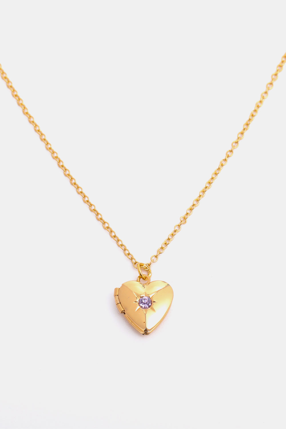 Gold heart locket necklace with purple gemstone and 14k gold chain