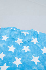 Patriotic t-shirt with white stars on a blue tie-dye background and ruffle sleeves.