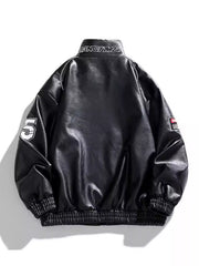 Black casual zip-up jacket with white piping, embroidered number 5 on sleeve, and collar text.