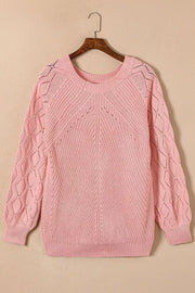 Dusty pink knit sweater with hollow-out diamond pattern on puffy sleeves and yoke.