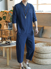 Navy blue men's 3/4 sleeve casual pants set with embroidered detail on shirt.