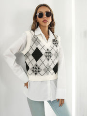 Argyle knit cropped sweater vest in white with black and grey diamond pattern, V-neck, sleeveless.