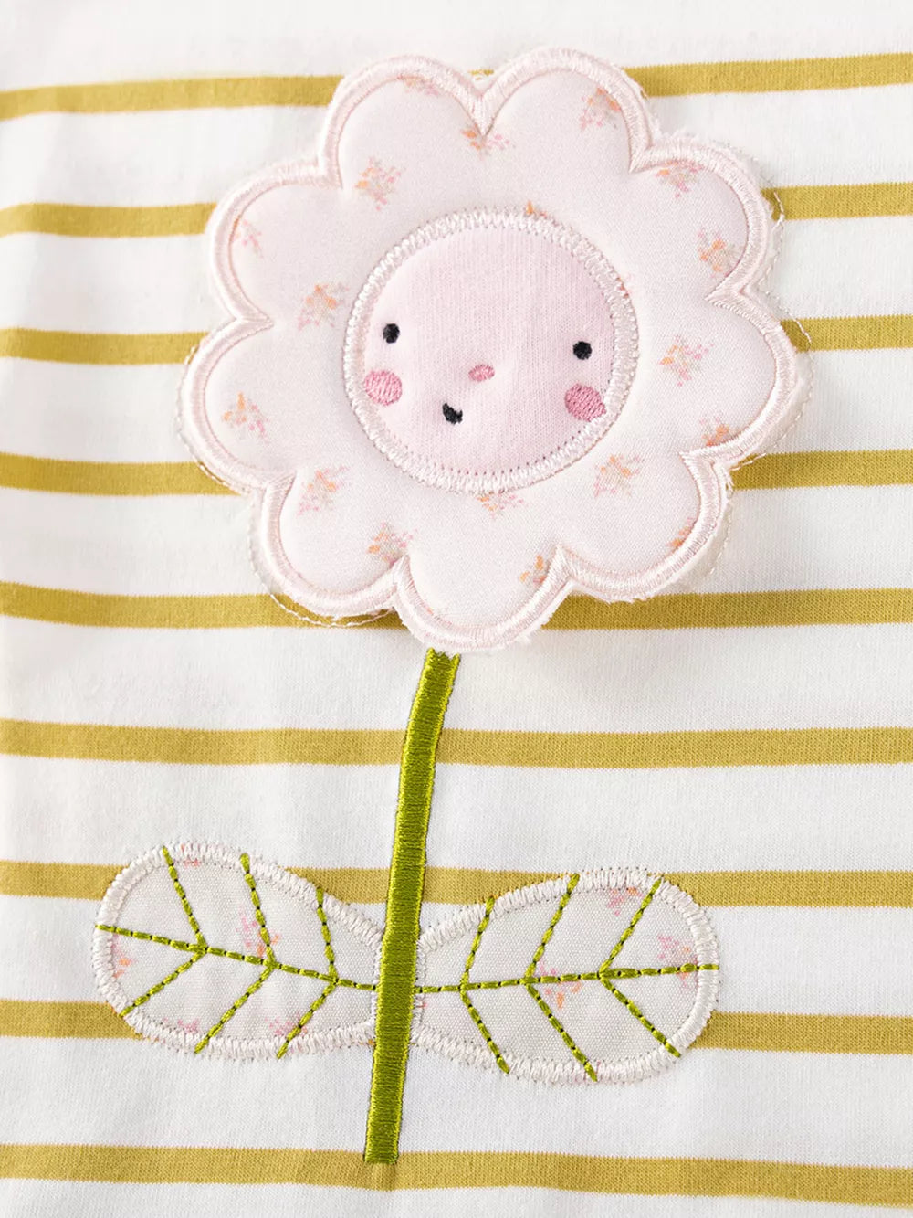 Baby top with flower applique on striped cotton fabric