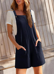 Dark Blue romper with square neck, adjustable straps, and pockets.