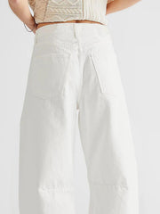 White frayed hemline palazzo jeans with a relaxed fit and wide leg.