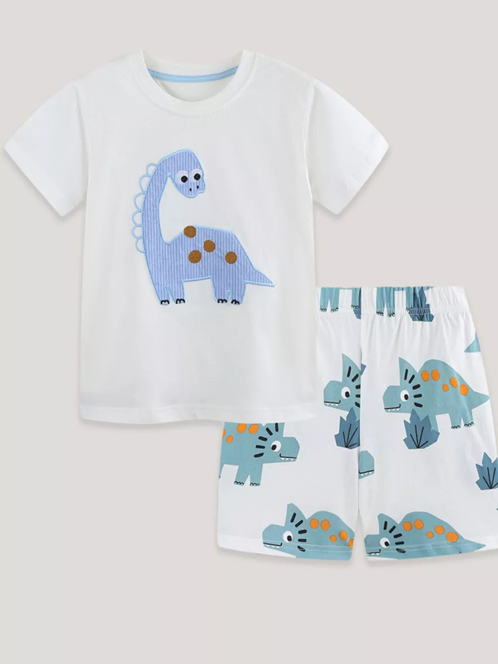 White cotton toddler t-shirt and shorts set with blue dinosaur applique and print.