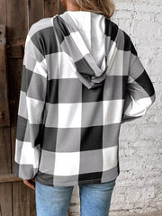 Buffalo plaid hoodie with button detail and hood, black and white.