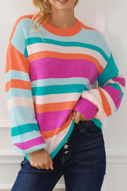 Rainbow stripe knit sweater with balloon sleeves and crew neck.