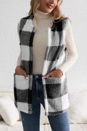 Oversized buffalo check sherpa gilet in black and white with pockets.