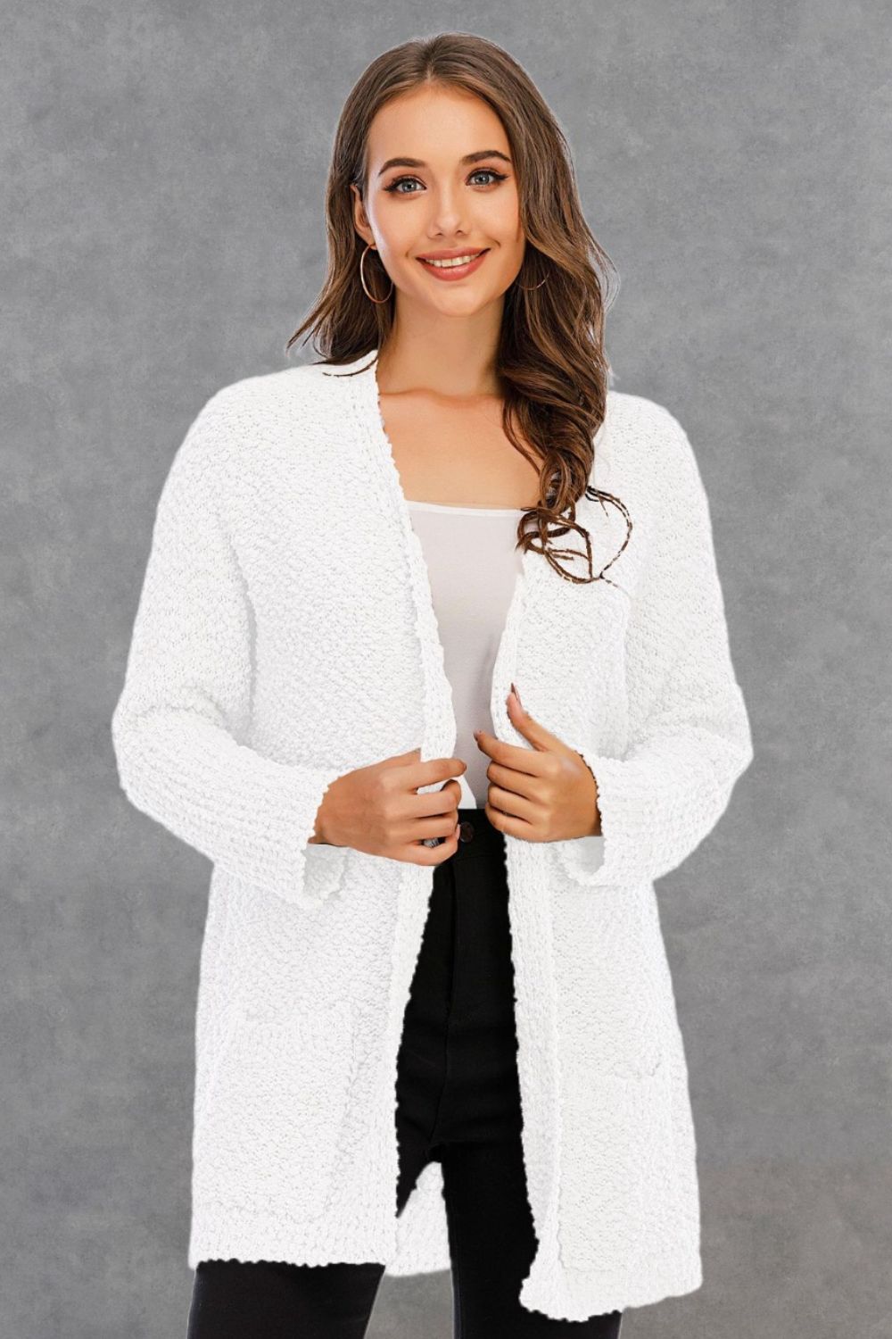 White textured cocoon cardigan with patch pockets and open front