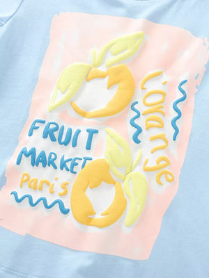 Baby blue cotton tee with playful 3D fruit market graphic and text.