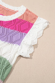 Rainbow crochet blouse with eyelet flutter sleeves and striped pattern.
