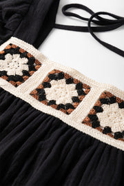 Black gauze blouse with crochet yoke detail and tie straps