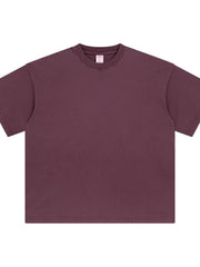 Oversized washed cotton crewneck t-shirt in plum purple with crew neckline and short sleeves.