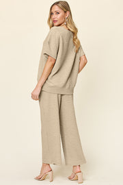 Khaki textured cocoon top and wide leg pants set with short sleeves and crew neck.