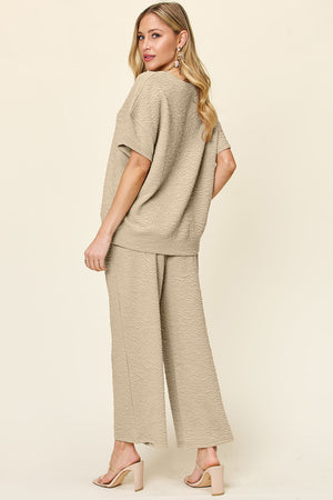 Khaki textured cocoon top and wide leg pants set with short sleeves and crew neck.