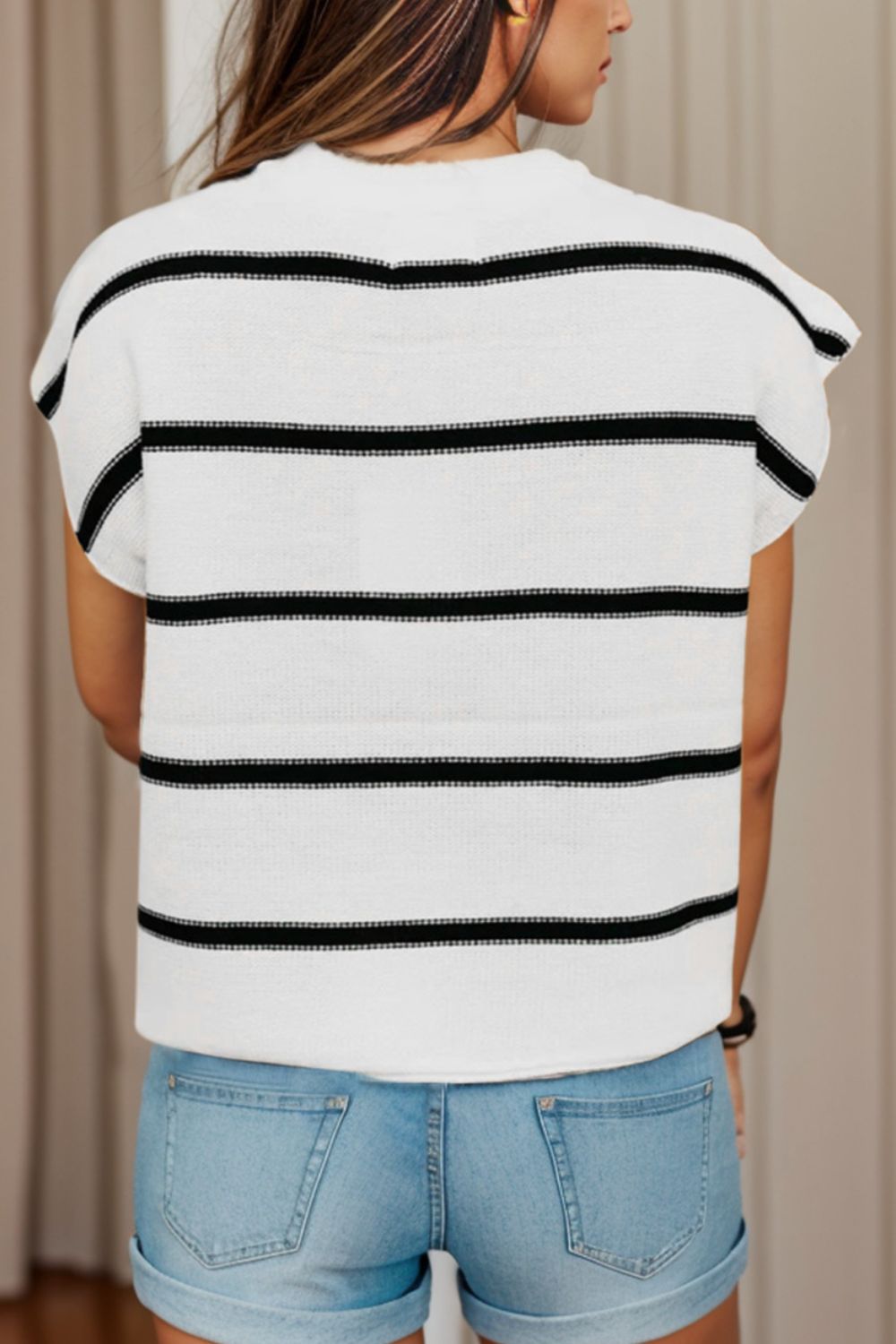 White knit shell top with black horizontal stripes and cap sleeves.