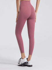 Dusty Pink 7/8 length leggings with a wide waistband and seamless construction.