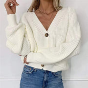 White ribbed knit cardigan with balloon sleeves and button front