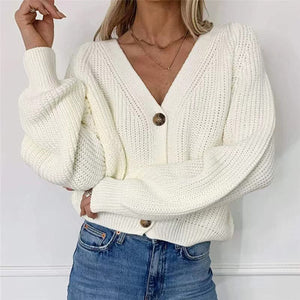 White ribbed knit cardigan with balloon sleeves and button front