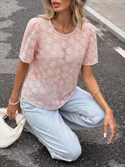 Pink floral embroidered sheer blouse with pearl trim and puff sleeves.