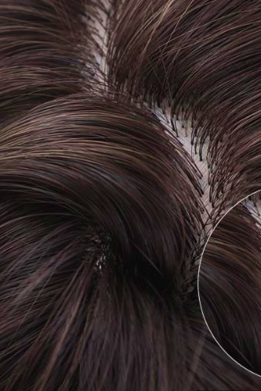 Textured bob wig in black, showing close-up of the hair roots and texture.