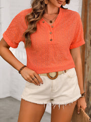 Orange-Red eyelet henley top with short sleeves and button detail.