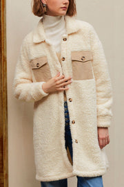 Beige sherpa coat with corduroy patch pockets and button front.