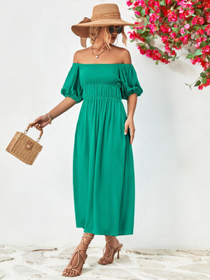 Turquoise off-shoulder midi dress with gathered bodice and balloon sleeves.