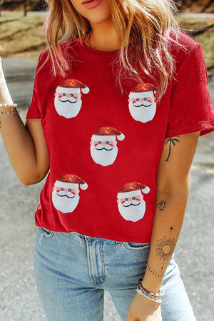 Red cotton t-shirt with scattered sequin Santa motifs and a crew neck.