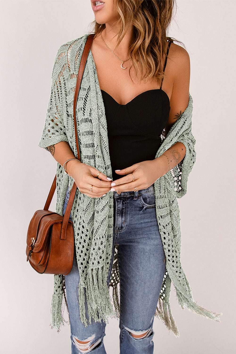 Sage open knit chevron fringe cardigan with short sleeves and a boho vibe.