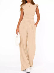 Apricot ruffled cap sleeve maternity two-piece ensemble with crew neck and wide leg pants.