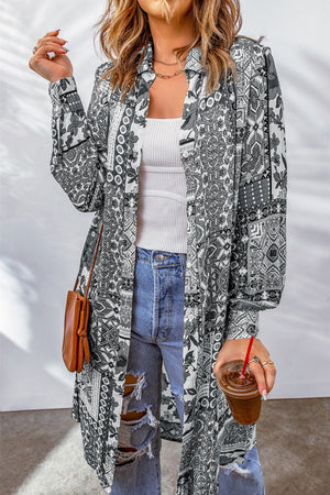 Patchwork print duster shirt jacket in gray with button front and long sleeves.
