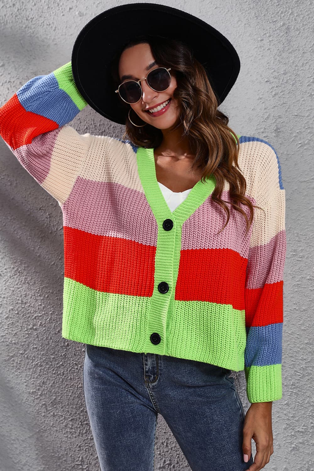 Rainbow block button-down knit cardigan with neon green neckline, acrylic knit, and black buttons.