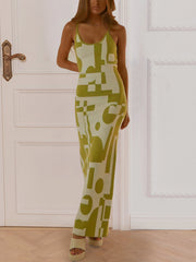Geometric knit maxi slip dress in yellow-green with abstract pattern, scoop neck, and spaghetti straps.