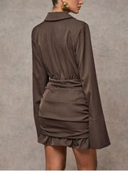 Brown ruched blazer dress with ruffled hem and bell sleeves.