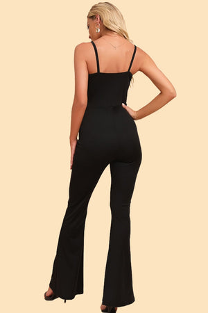 Black mesh panel flare jumpsuit with spaghetti straps and a square neckline.