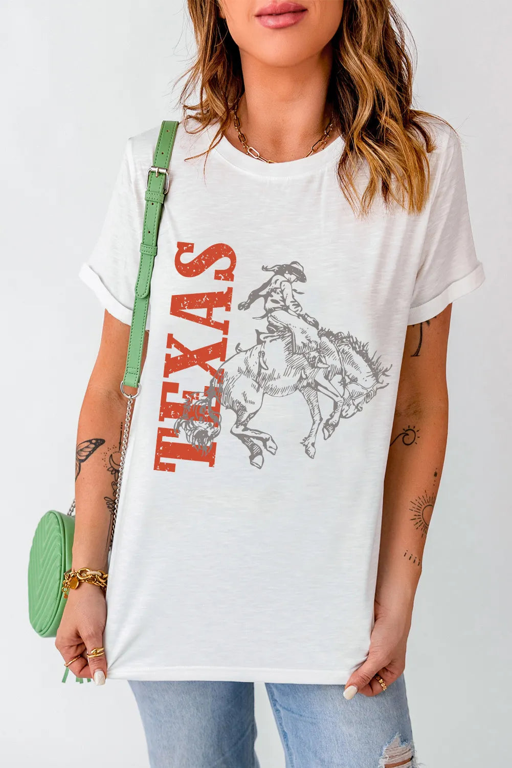 White crewneck tee with Texas rodeo graphic print and distressed lettering