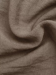 Brown smocked strapless wide-leg romper fabric detail