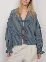 Stripe blouse with tie front, ruffled heart appliqués and balloon sleeves.