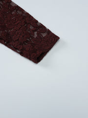 Sheer lace blouse in burgundy with long sleeves and floral pattern detail.